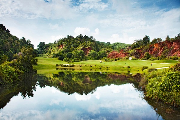 Reflection of Red Mountain Golf Club on the water